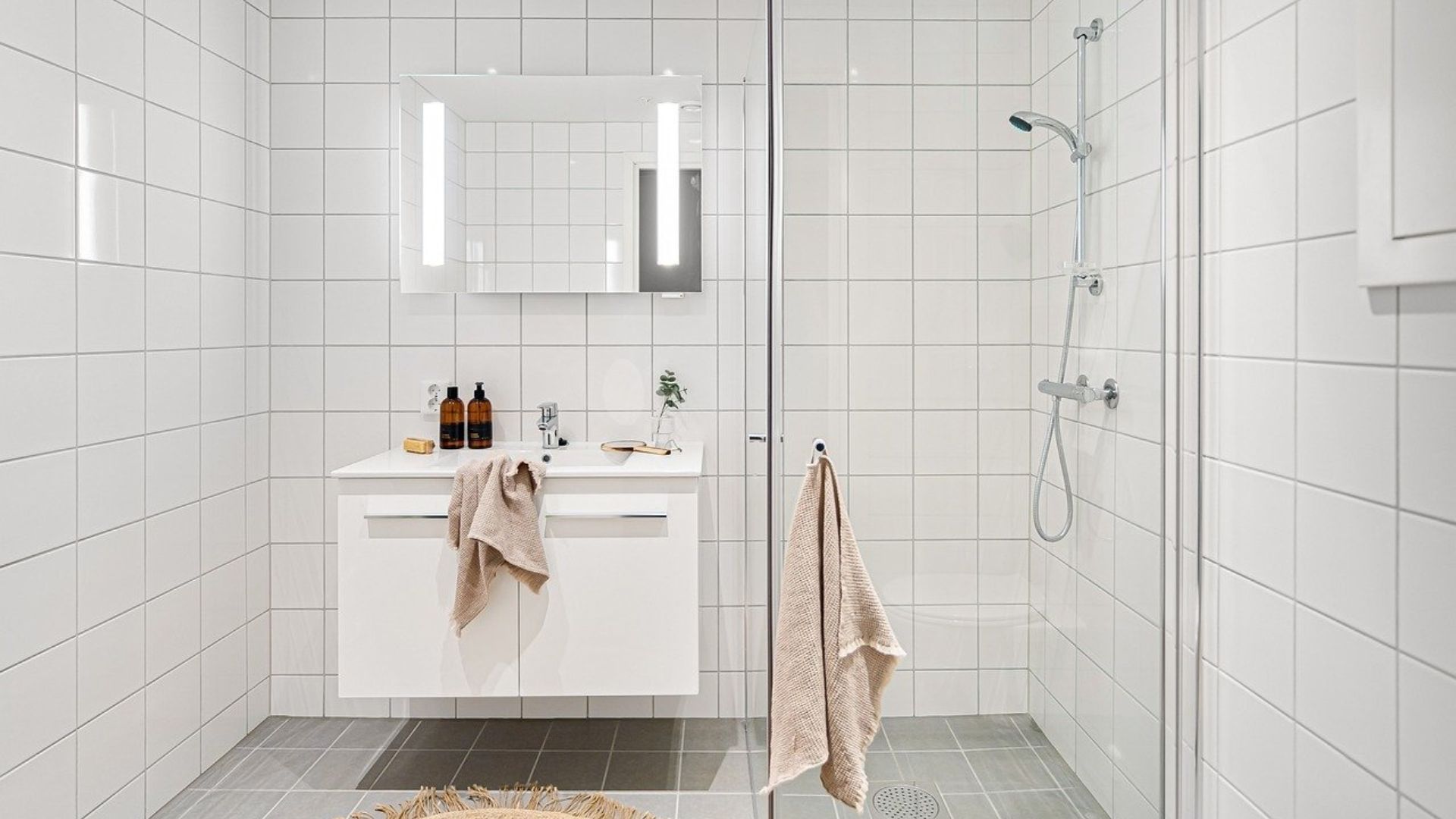 A standing shower in an ADA compliant bathroom